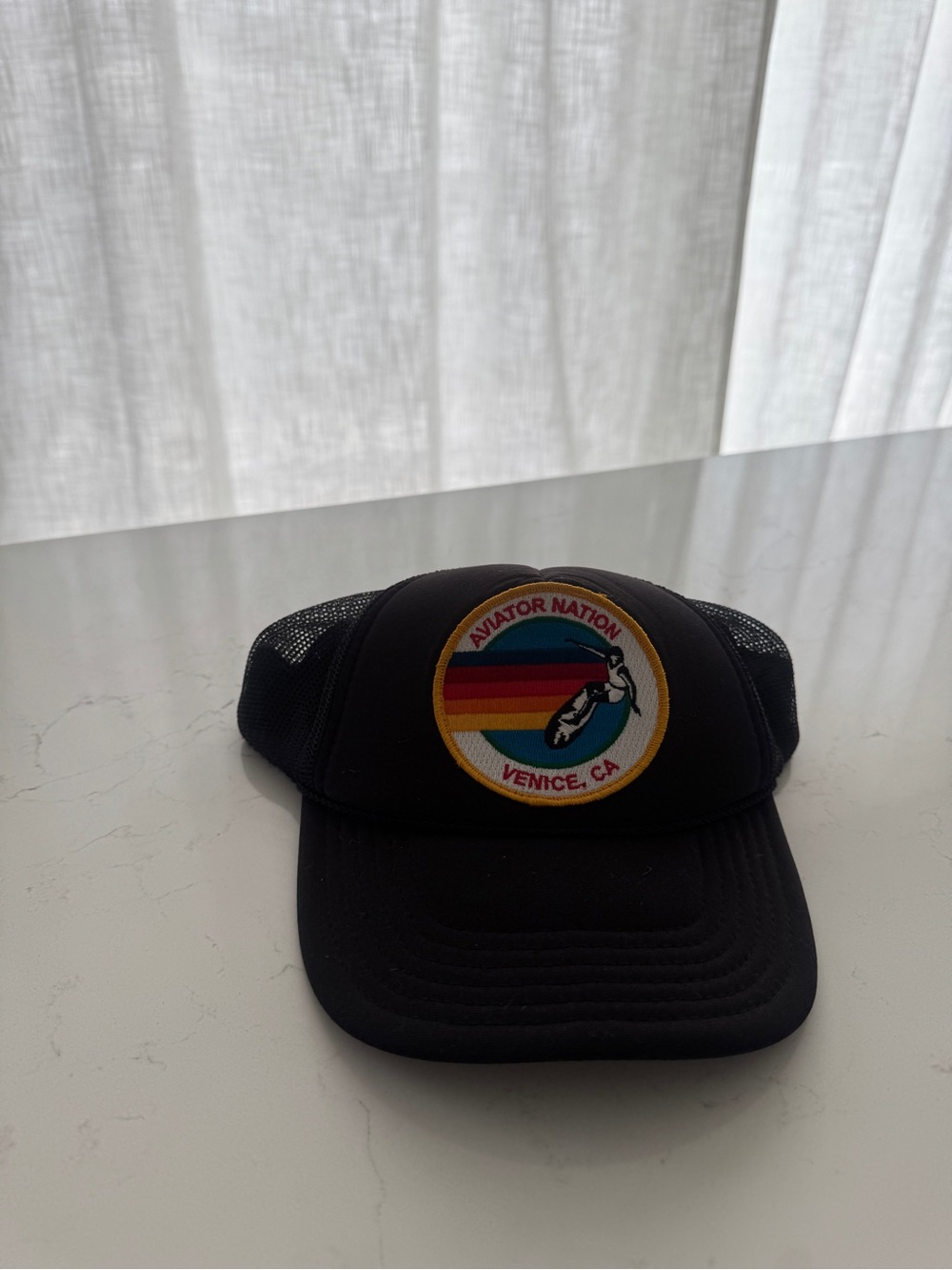 Aviator Nation Black Trucker Hat with Rainbow Wave Patch
